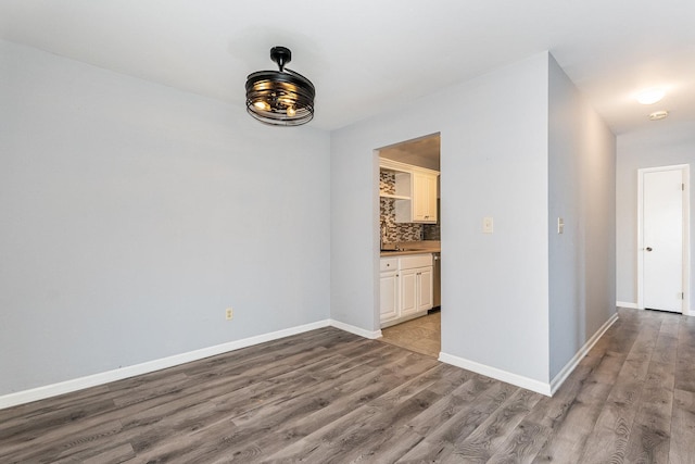 spare room with light hardwood / wood-style floors