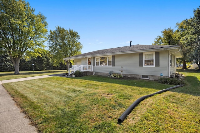 ranch-style house with a porch and a front lawn