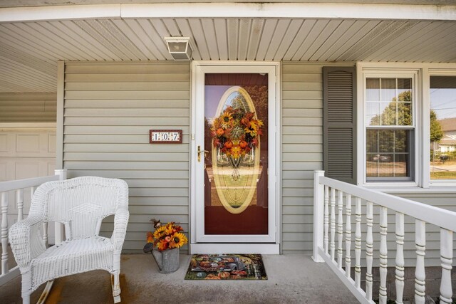 doorway to property with covered porch