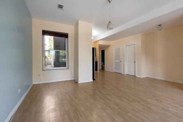 empty room featuring light wood-type flooring