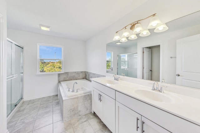 bathroom with vanity, tile patterned floors, and separate shower and tub