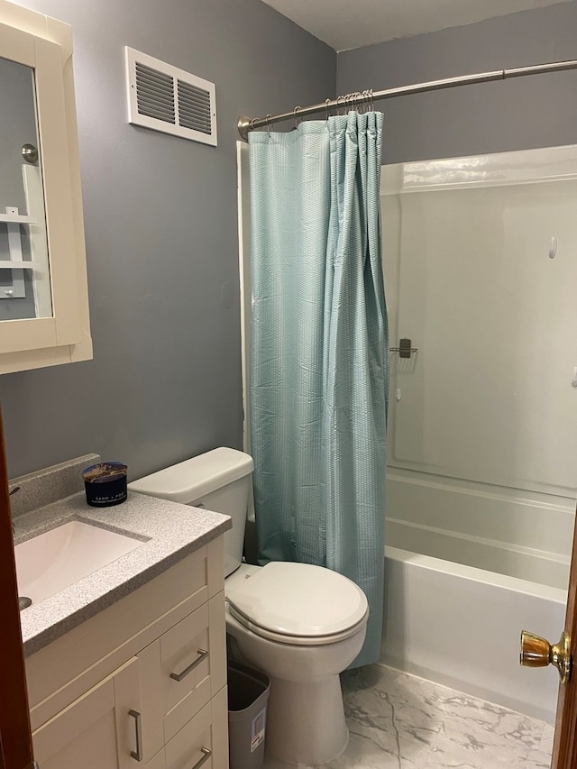 full bathroom with shower / bath combination with curtain, vanity, and toilet