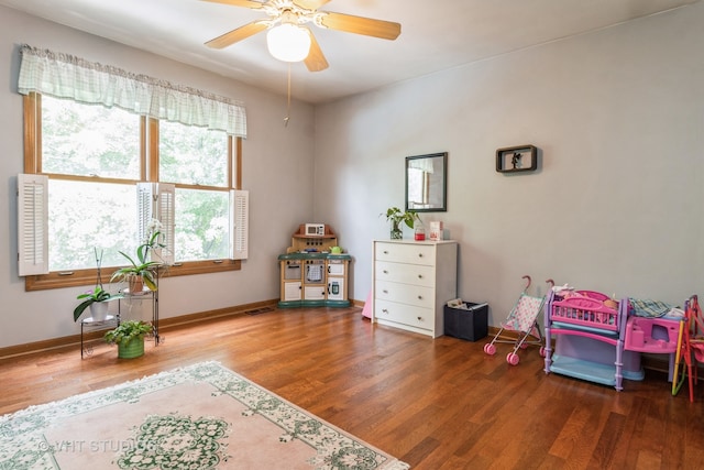 game room with ceiling fan and hardwood / wood-style floors