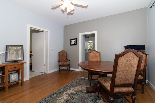 dining area featuring ceiling fan and light hardwood / wood-style flooring