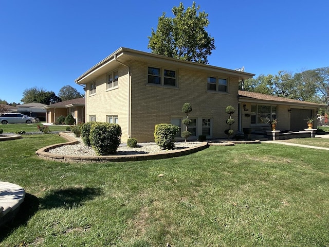 exterior space featuring brick siding and a yard