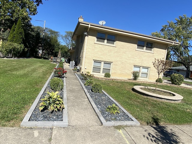 view of home's exterior featuring a yard