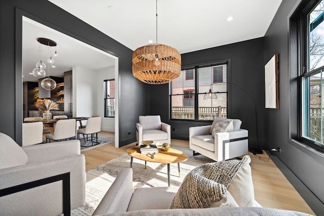 living room with light hardwood / wood-style flooring