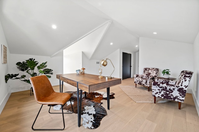 office area with lofted ceiling and light hardwood / wood-style floors