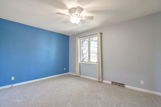 unfurnished room with carpet floors and ceiling fan