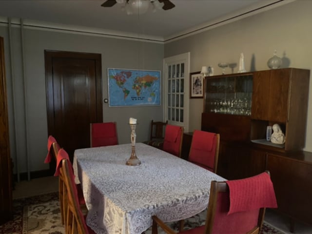 dining room with a ceiling fan