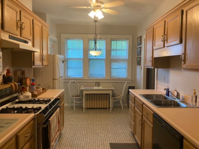 kitchen featuring white appliances, pendant lighting, radiator heating unit, ceiling fan, and sink