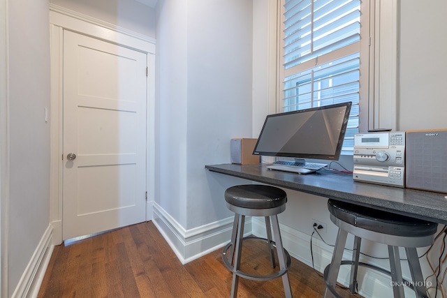 office area with dark wood-type flooring