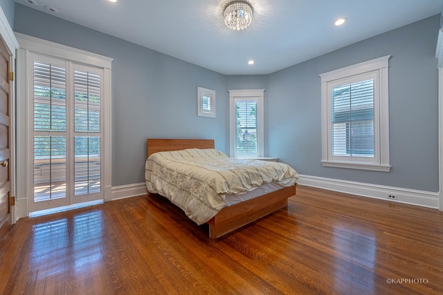 bedroom featuring dark hardwood / wood-style floors