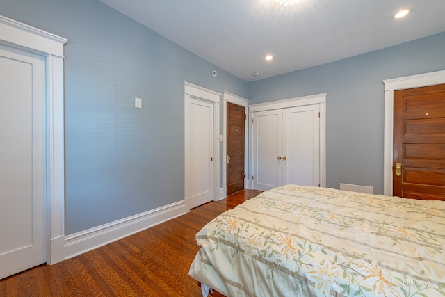 bedroom featuring a closet and hardwood / wood-style floors