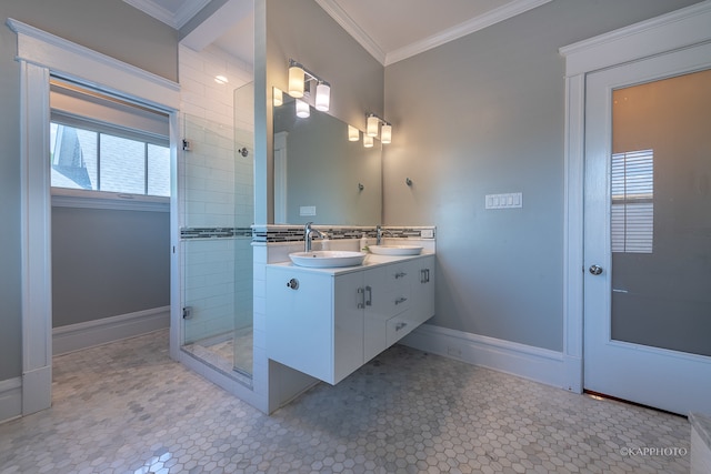 bathroom featuring ornamental molding, vanity, tile patterned floors, and a shower with shower door