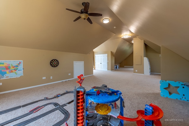 game room featuring vaulted ceiling, ceiling fan, and carpet floors