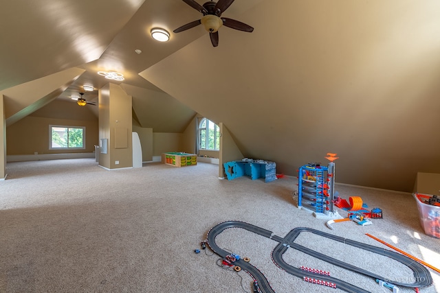 recreation room featuring carpet floors, lofted ceiling, and ceiling fan