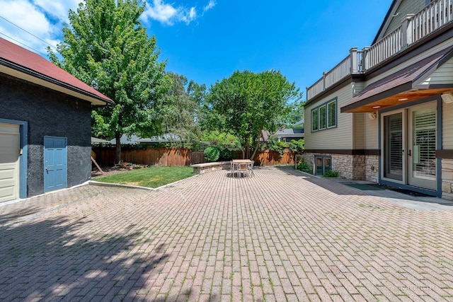 view of patio / terrace with a balcony