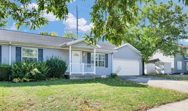 ranch-style home featuring a front lawn, a storage shed, and a garage