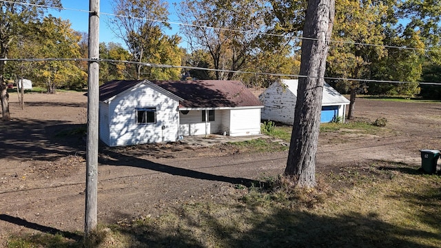 exterior space with an outbuilding