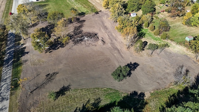 birds eye view of property featuring a rural view