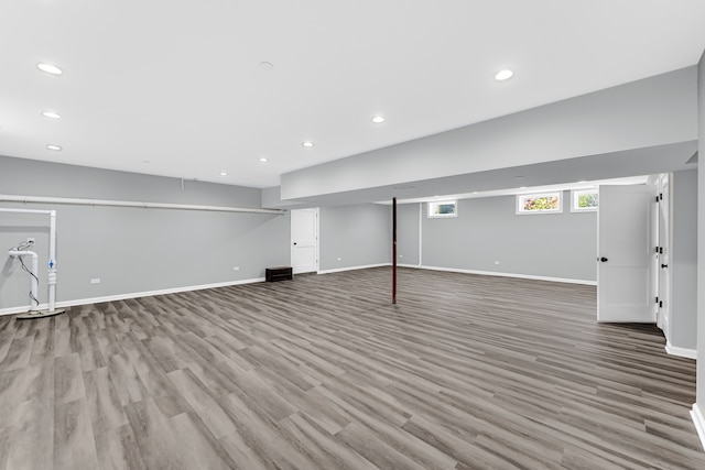 basement featuring light hardwood / wood-style floors