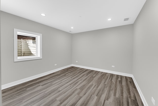 unfurnished room featuring light wood-type flooring