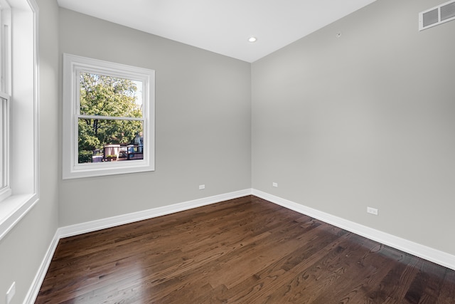 empty room featuring hardwood / wood-style floors