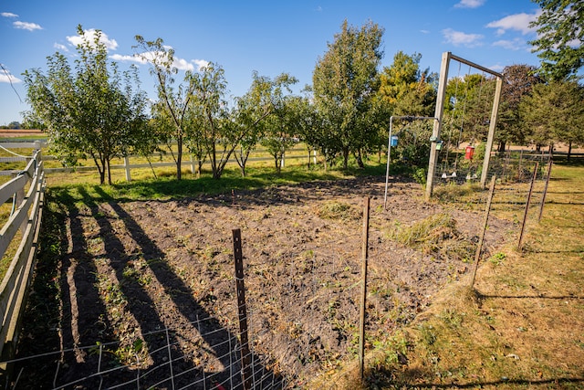 view of yard with fence