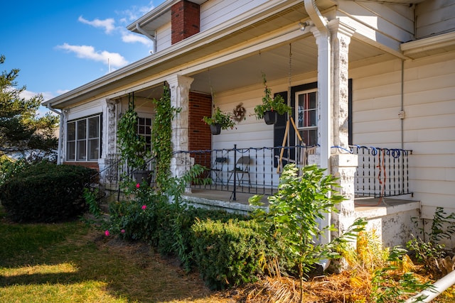 property entrance featuring covered porch