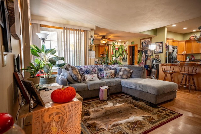 11971 W E Rd, Forreston, IL 61030 - living room with light wood-style flooring, ceiling fan, and recessed lighting