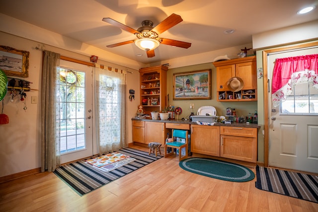 home office featuring a ceiling fan, baseboards, wood finished floors, and recessed lighting