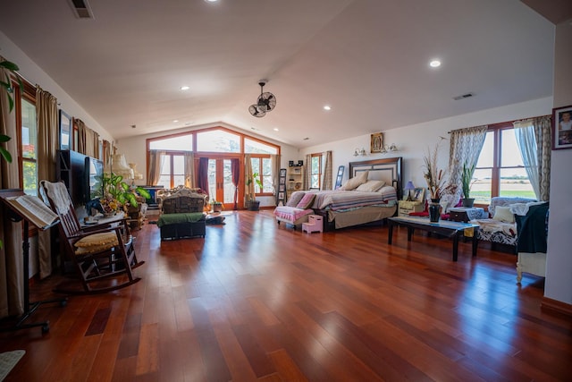 11971 W E Rd, Forreston, IL 61030 - bedroom featuring lofted ceiling, wood finished floors, multiple windows, and recessed lighting