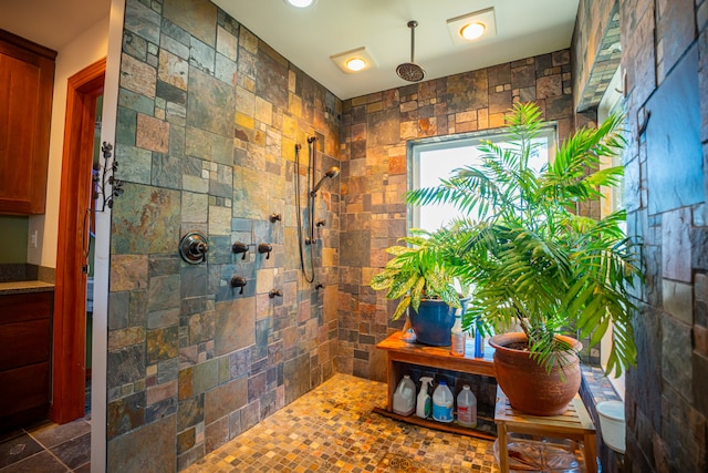 bathroom with a walk in shower