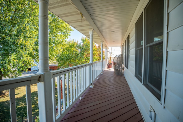 wooden deck featuring covered porch