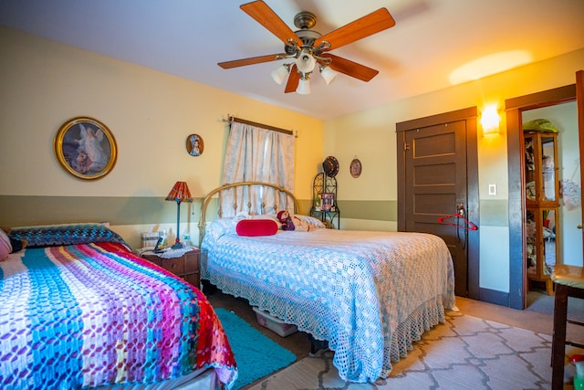 bedroom featuring carpet floors and a ceiling fan