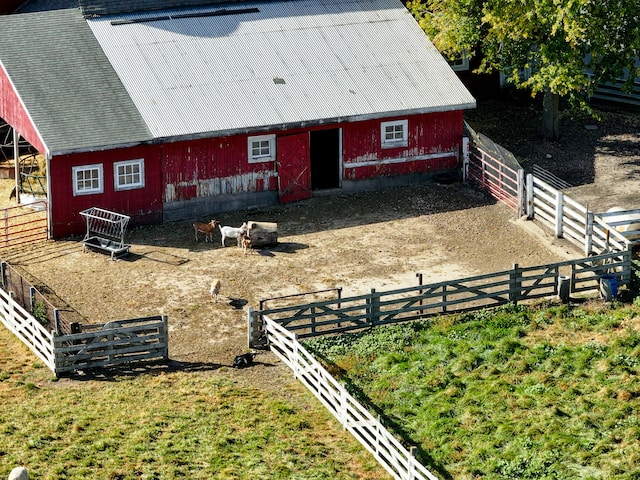 exterior space with fence and an outdoor structure