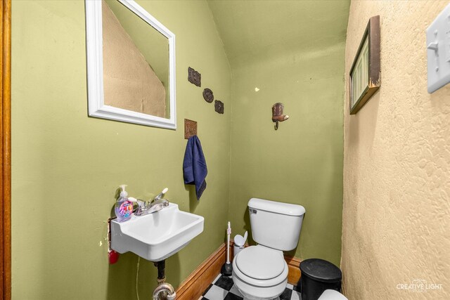 bathroom with sink and toilet