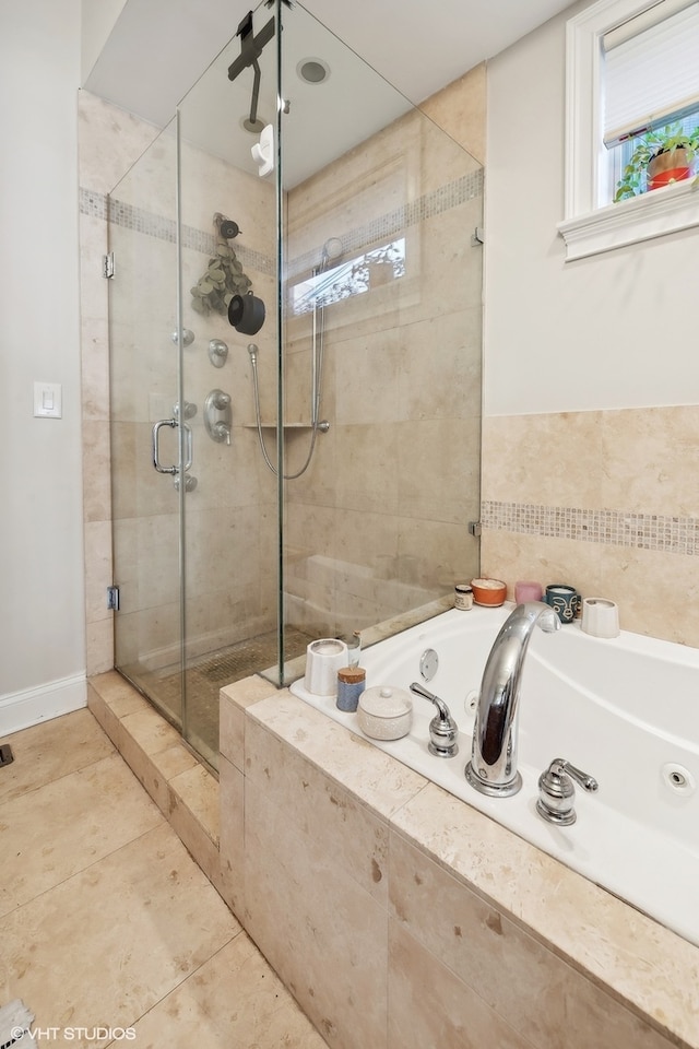 bathroom featuring tile patterned floors and plus walk in shower