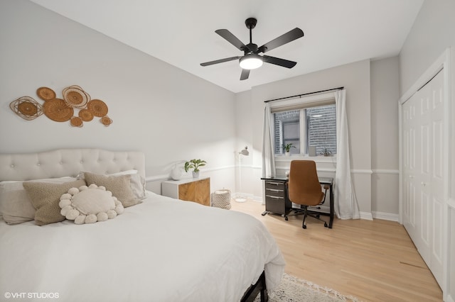 bedroom featuring hardwood / wood-style floors, a closet, and ceiling fan