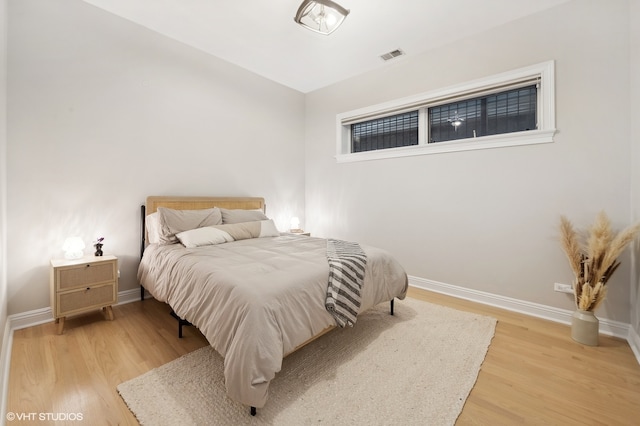 bedroom featuring wood-type flooring