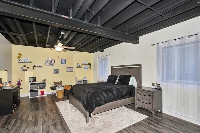 bedroom featuring dark hardwood / wood-style flooring and ceiling fan