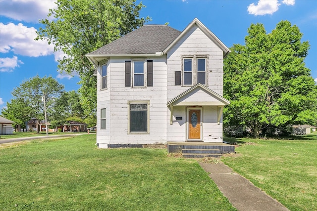 view of front of property featuring a front yard