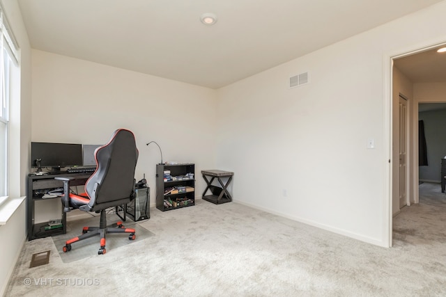 view of carpeted office space