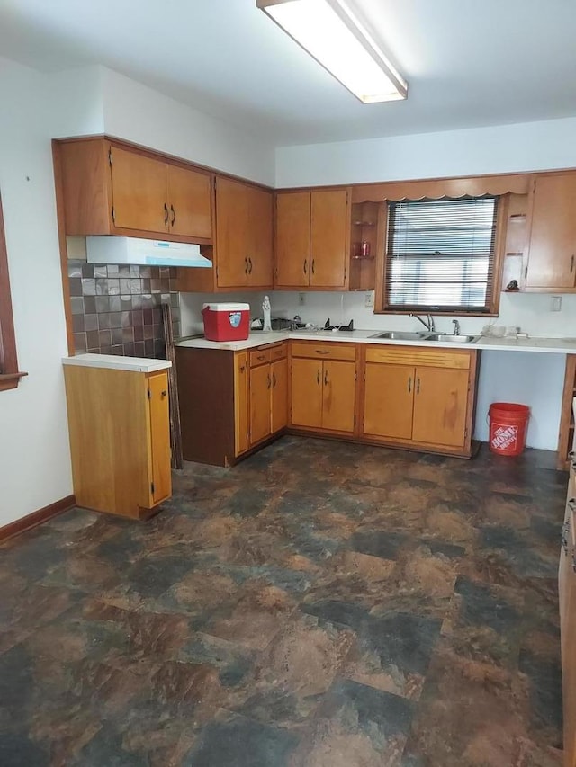 kitchen with sink and tasteful backsplash