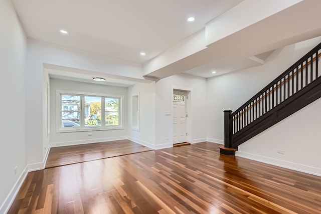 entryway featuring dark wood-type flooring