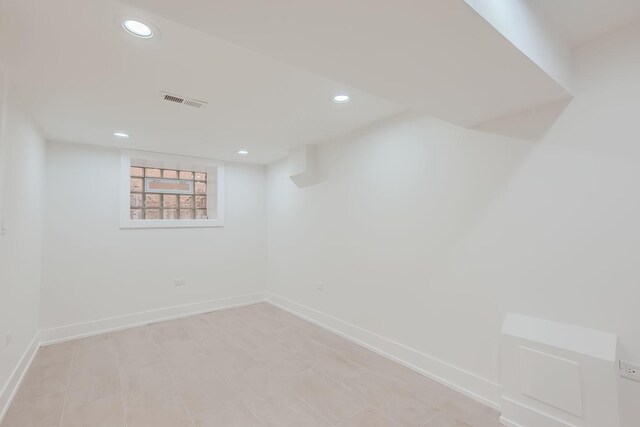 8513 S Maryland Ave, Chicago, IL 60619 - basement featuring visible vents, baseboards, and recessed lighting