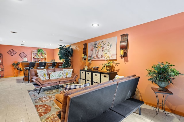 living room with light tile patterned flooring