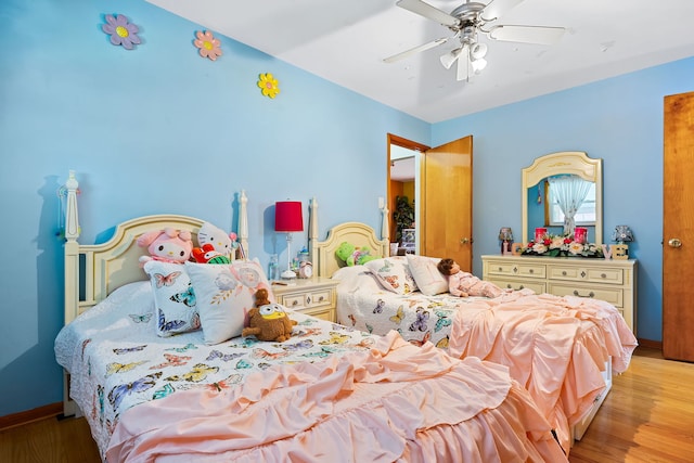 bedroom featuring ceiling fan and light hardwood / wood-style floors