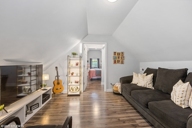 living room featuring lofted ceiling and dark hardwood / wood-style floors